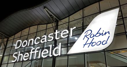 Doncaster Sheffield Airport main sign in bright white.