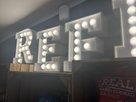 Built up letters illuminated via mini dome LED lights